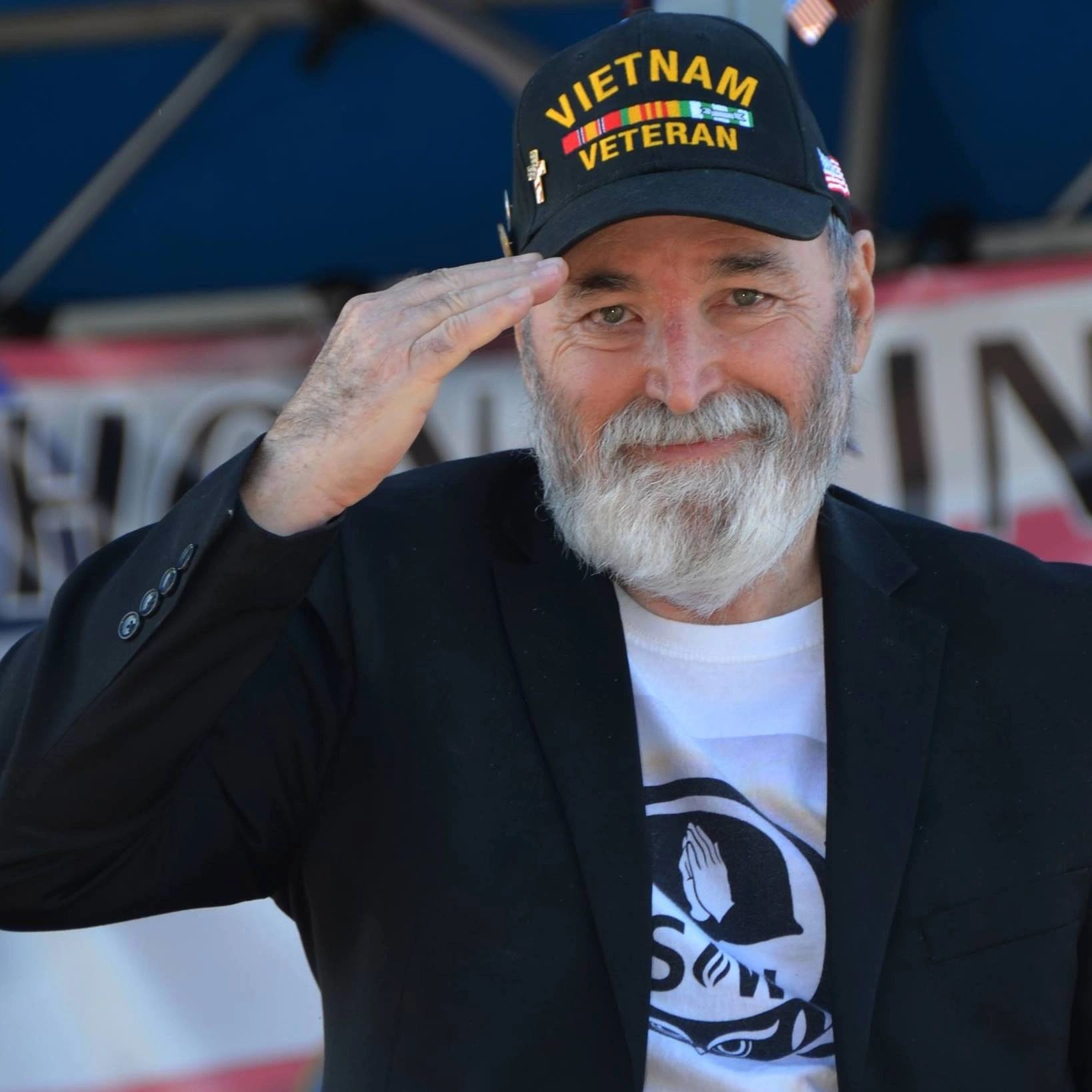 Rev. Bill McDonald giving a salute