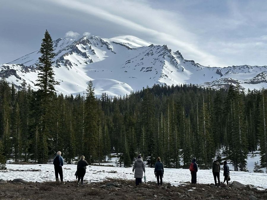 The group taking in Mount Shasta together